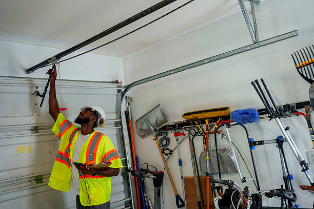 Professional Garage Door Panel Replacement technician working in Wayne County County, NE